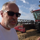 Illustration for article titled Heres How a 360 HP Turbo Diesel Combine Harvester Worksem/em